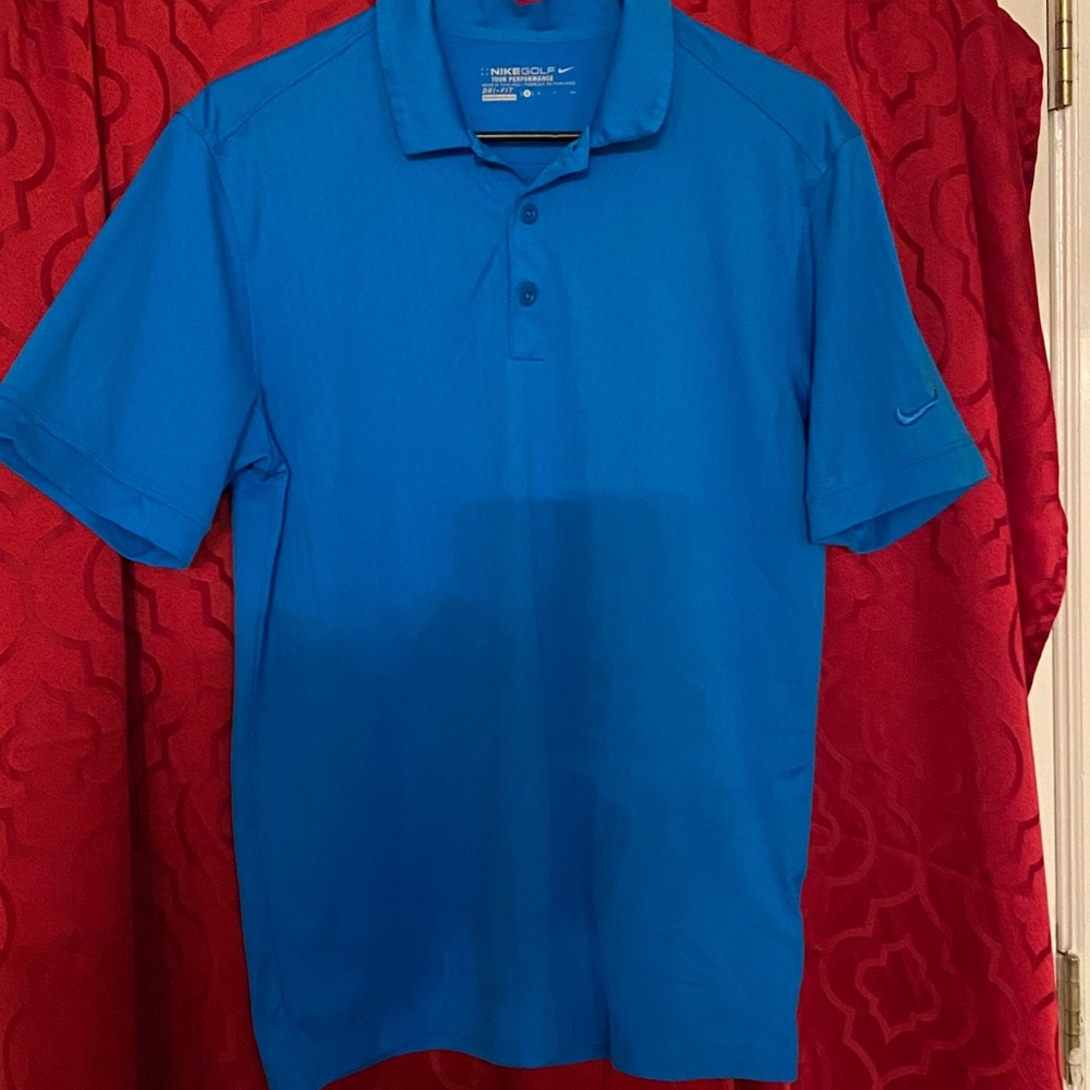 Nike golf shirt.